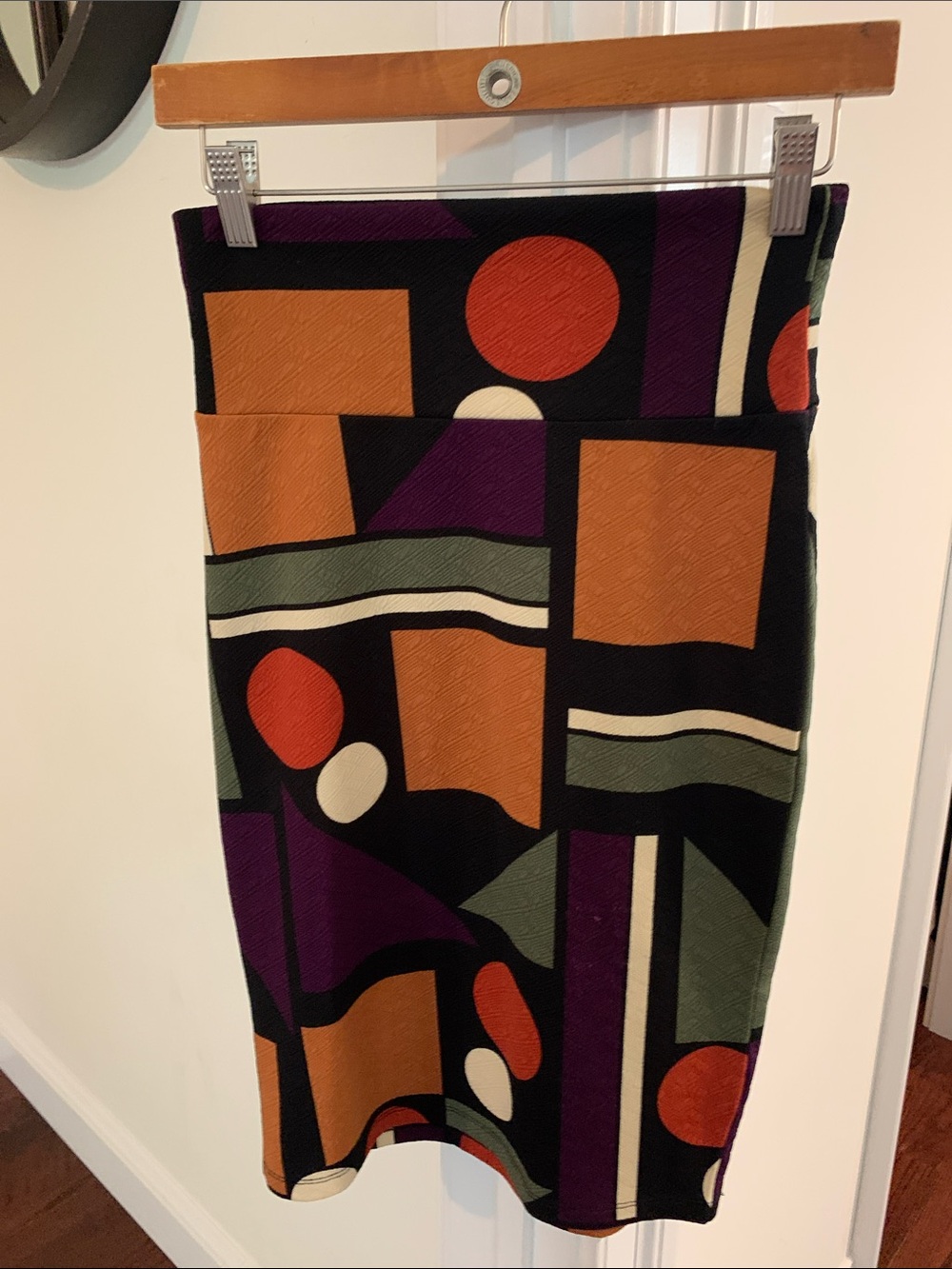 LuLaRoe Black Pencil Skirt with Orange, Purple & Green Geometric Print